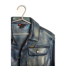 STONE SCULPTURE OF A DIESEL JEAN JACKET