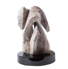 STONE SCULPTURE SHOWING RELATIONSHIPS