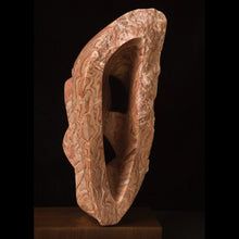 STONE CARVING OF A CAVE