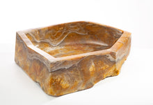 BOWL CARVED OUT OF STONE